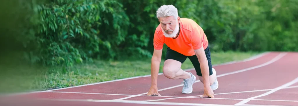 elderly man starting for run 1400x500 crop center